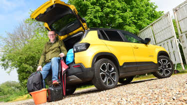 Auto Express editor-at-large John McIlroy sitting in the Jeep Avenger's boot